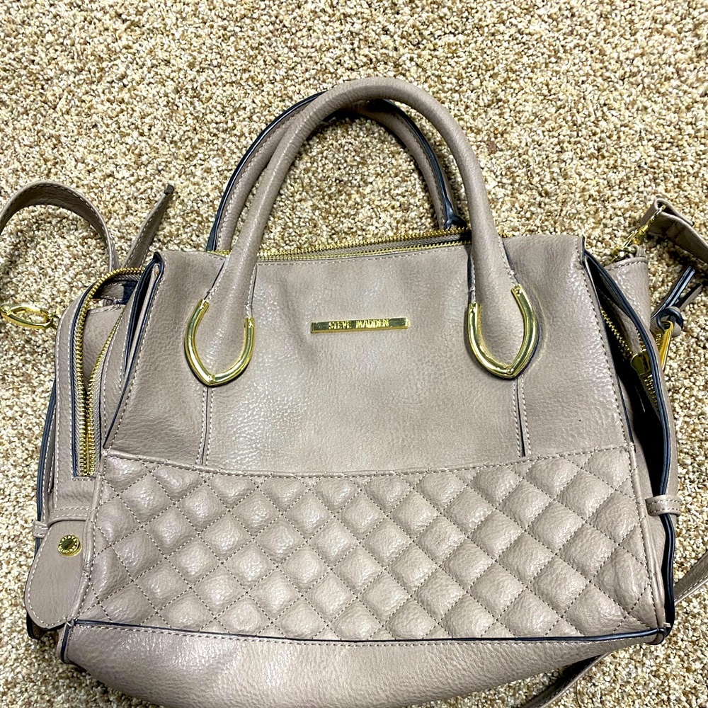Steve Madden  tote bag with shoulder and crossbody straps.